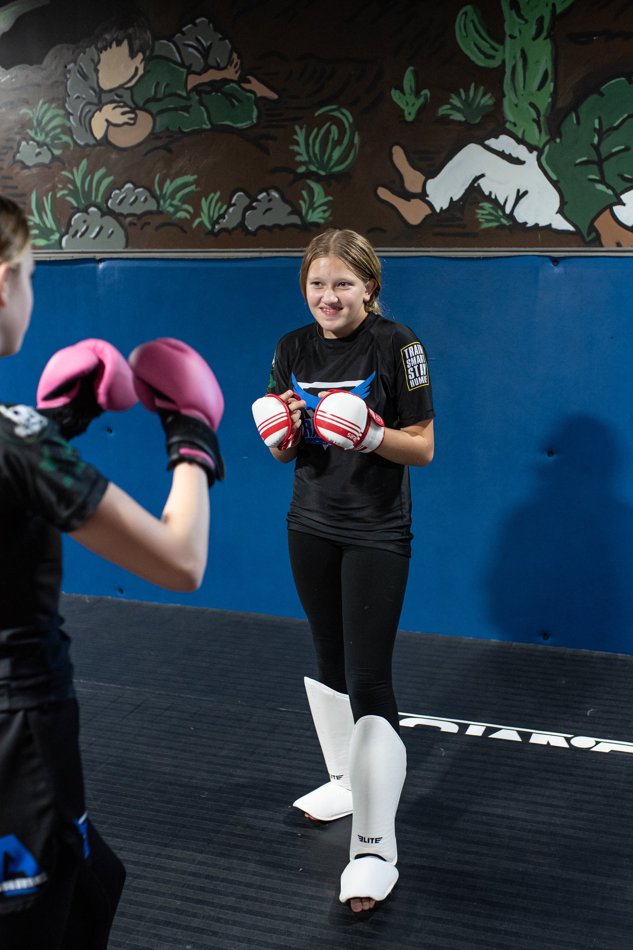 Teen kickboxing partner drill
